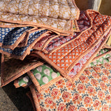 Quilted rug - Tangerine / Purple
